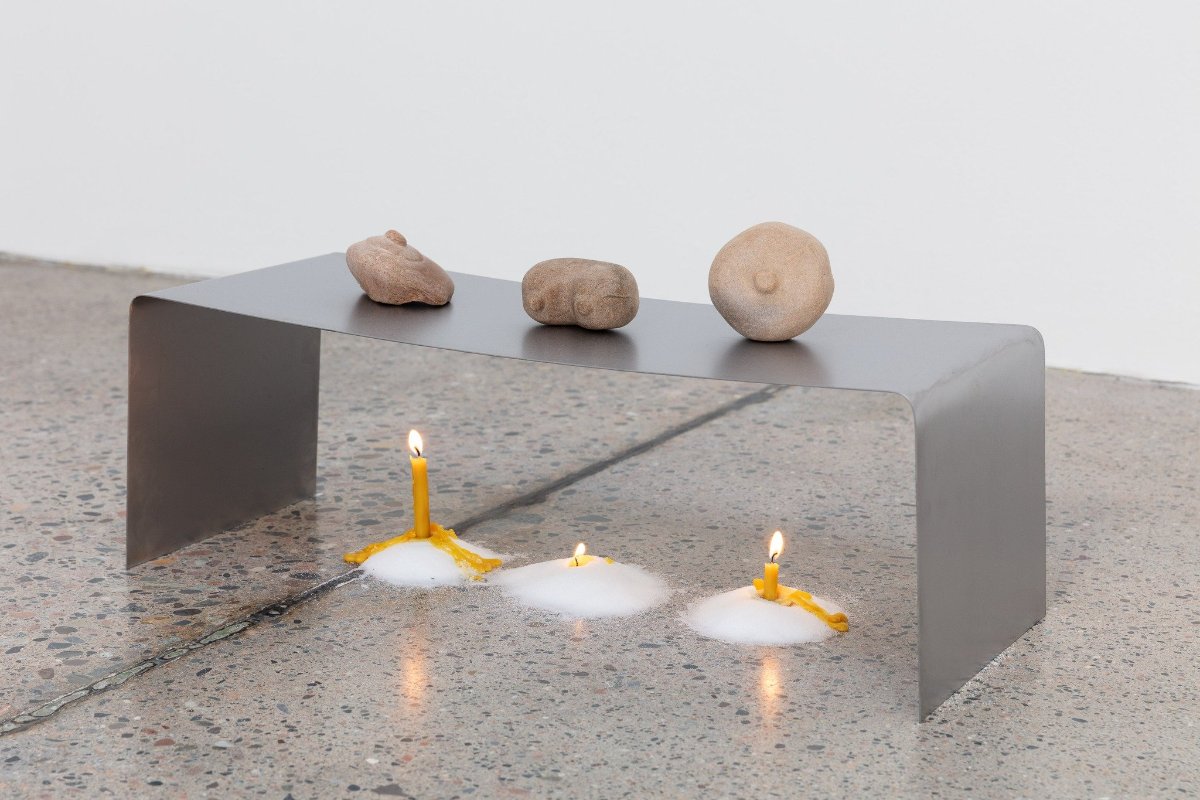 May be an image of candle holder and lighting