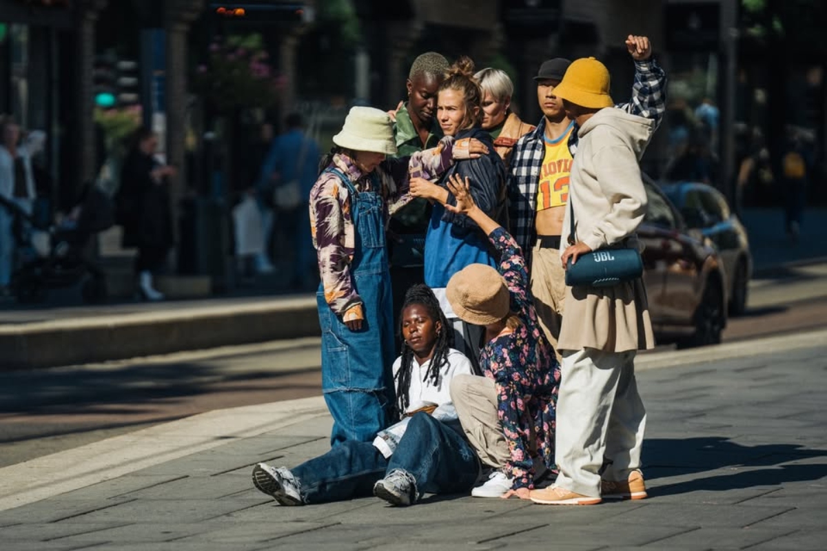 May be an image of 8 people, child, street and crowd