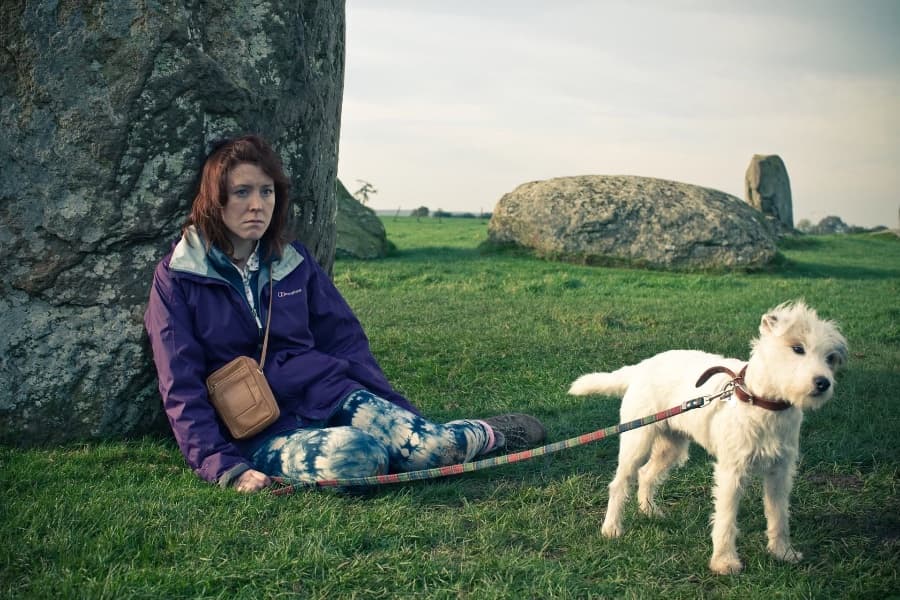May be an image of Stone Henge and grass
