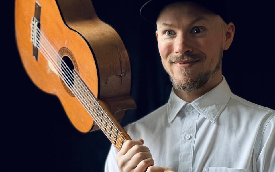 May be an image of guitar