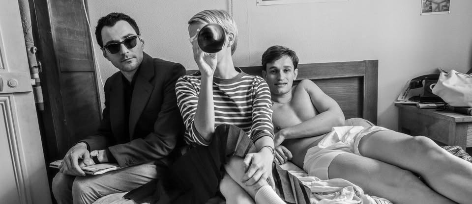 May be a black-and-white image of one or more people and bedroom