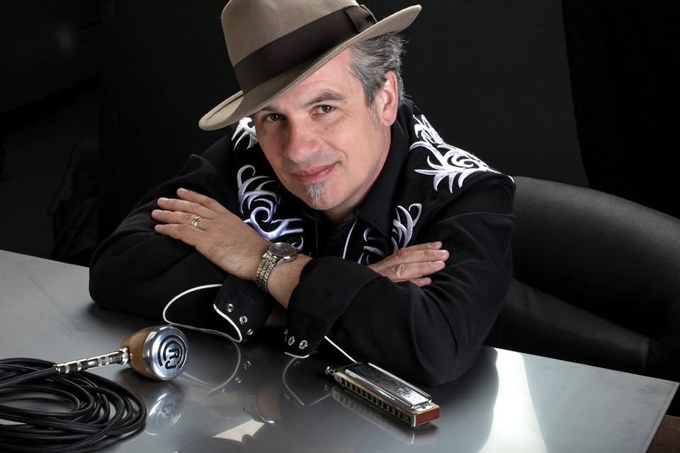 May be an image of hat and text