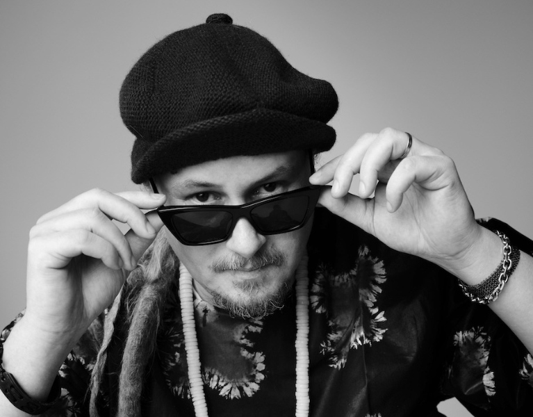 May be a black-and-white image of 1 person, hat and eyewear