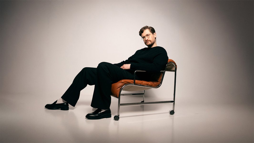 May be an image of one or more people and suit