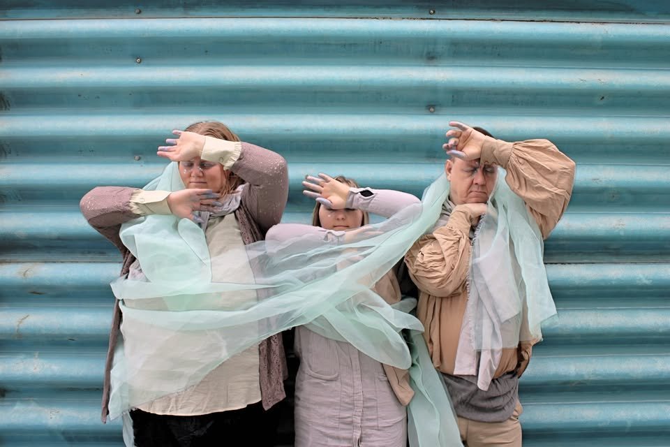 May be an image of one or more people and scarf