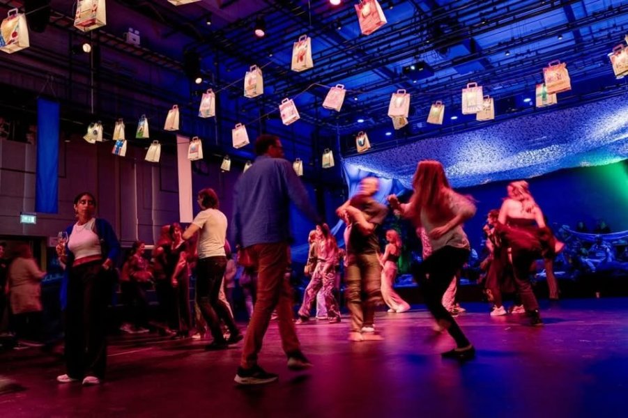 May be an image of one or more people, people dancing, lighting and crowd