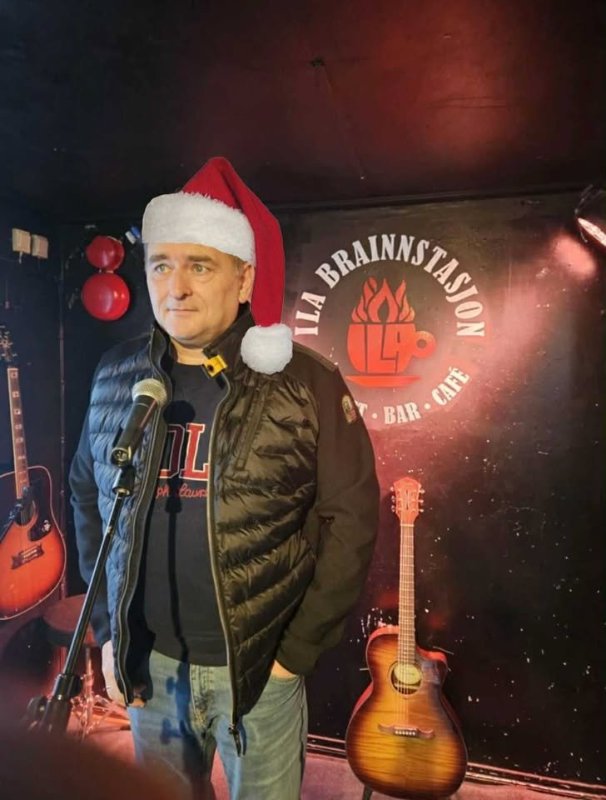 May be an image of guitar, hat and text