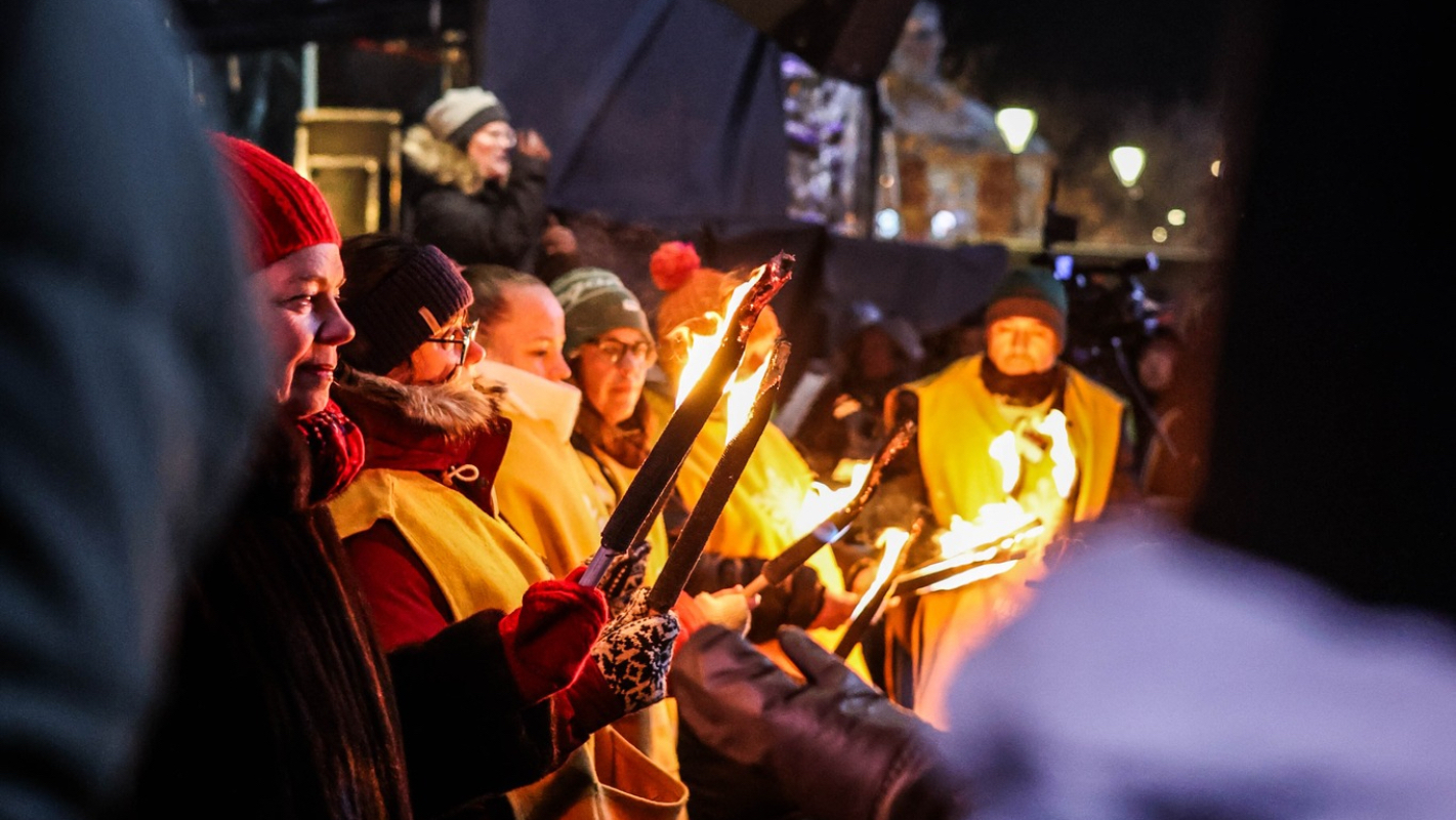 May be an image of 5 people, fire and crowd