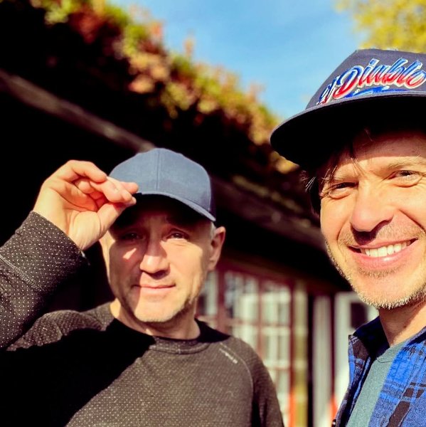 May be an image of hat and text