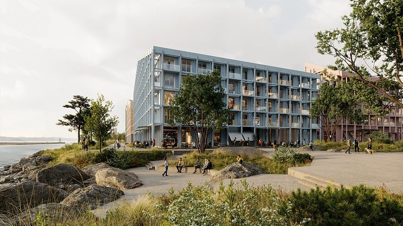 Bilde av et leilighetsbygg med en stor park utenfor. 