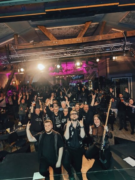 May be an image of trumpet, saxophone, violin, speaker and crowd