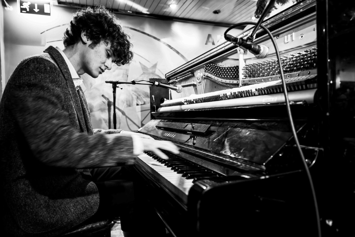 May be a black-and-white image of piano