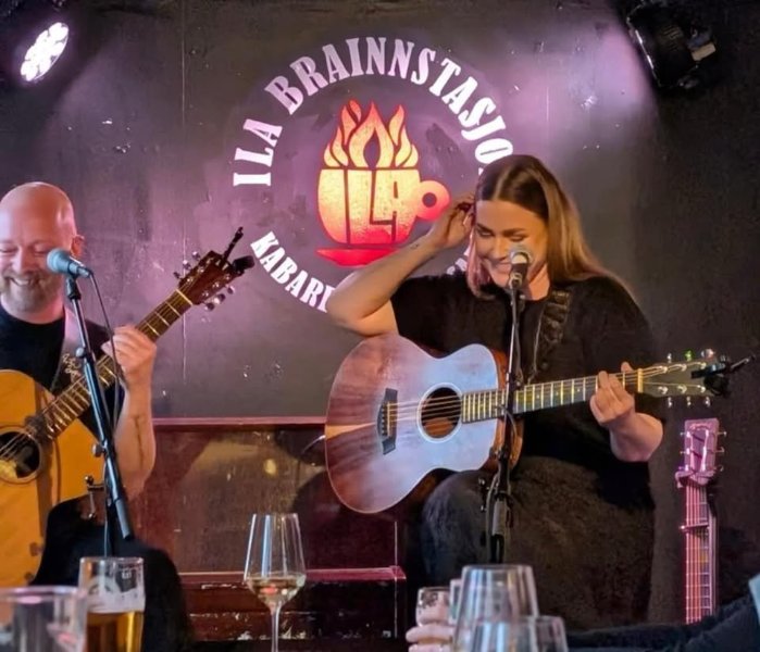 May be an image of guitar, violin and text