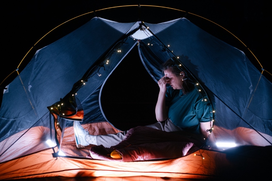 May be an image of 1 person and camping