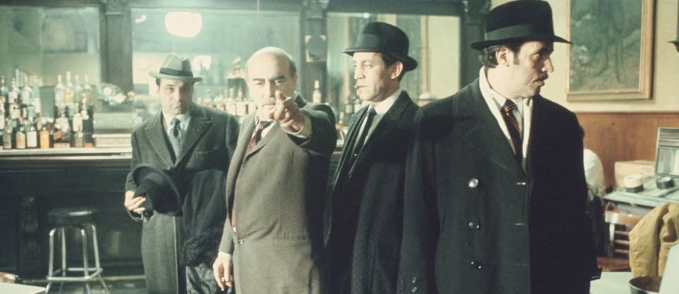 May be an image of overcoat