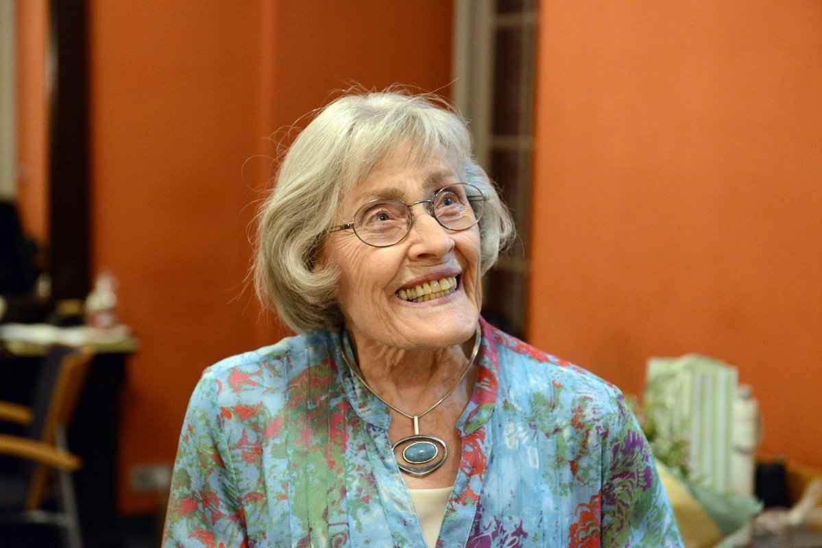 One lady smiling