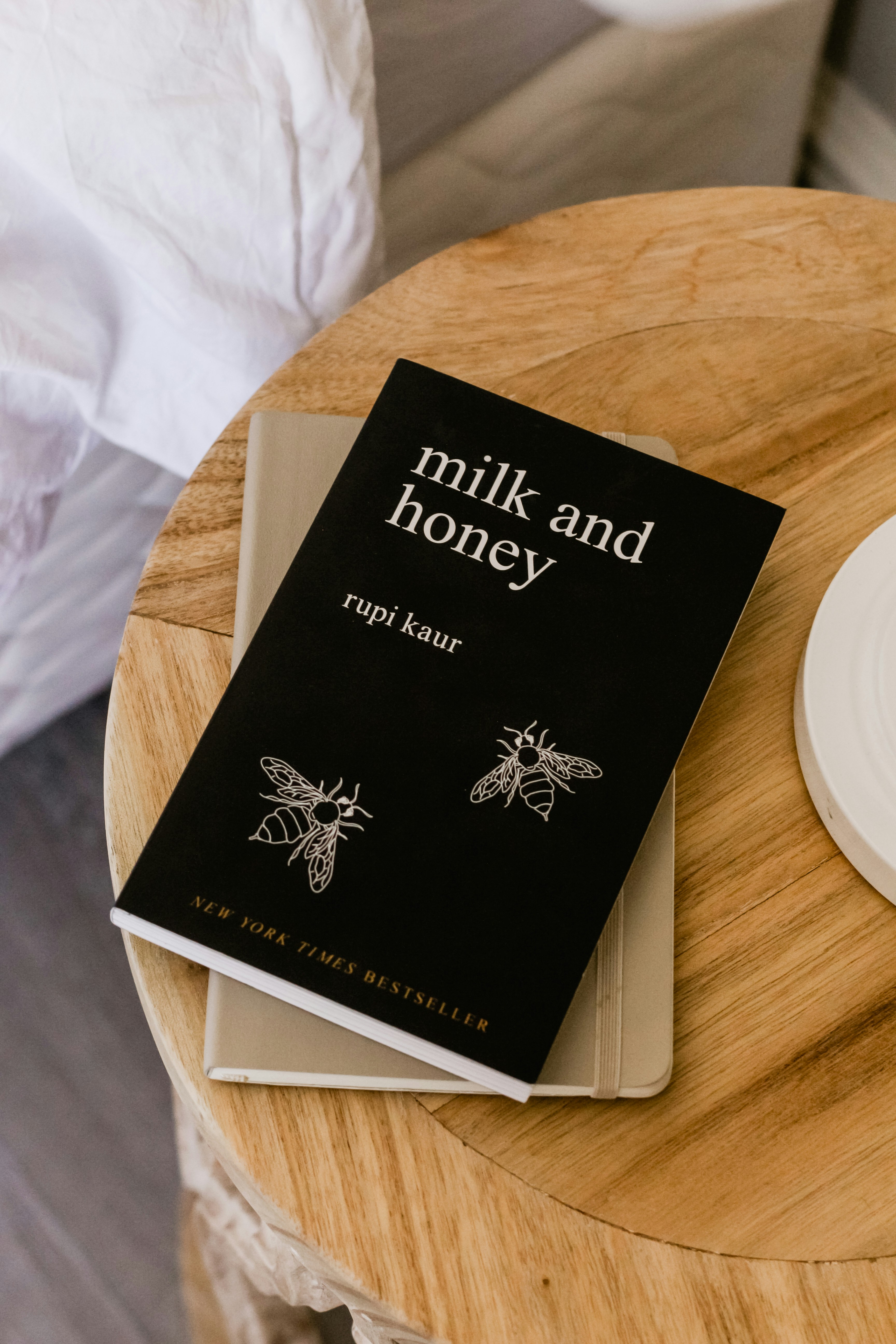An open novel representing modern fiction books with dramatic lighting