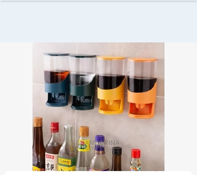 Wall mounted oil, spices or seasoning pot 