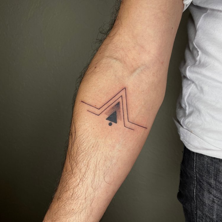 Tatuaje de Alan