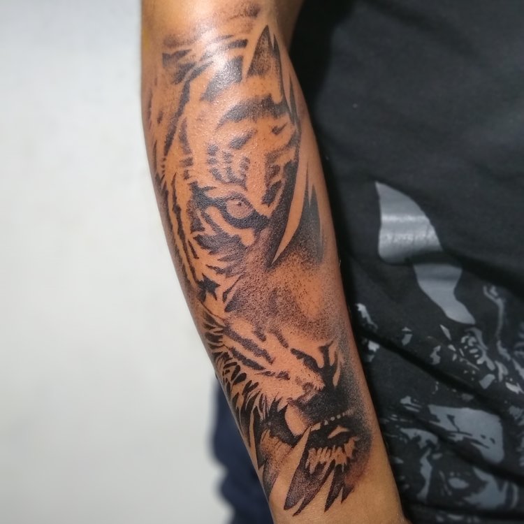 Tatuaje de Sublime Design Tattoo Art