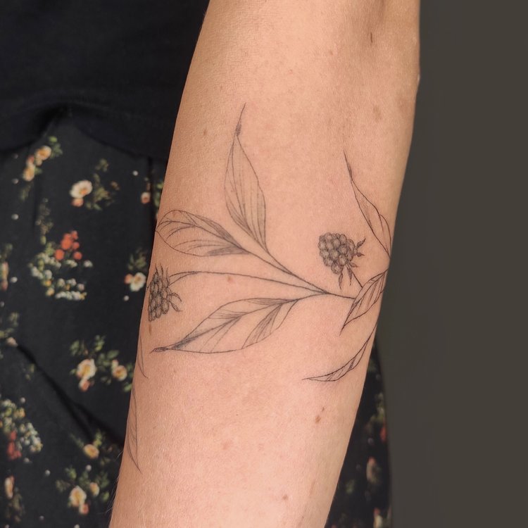 Tatuaje de Regina Tattoo
