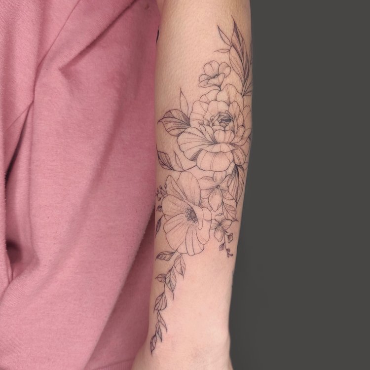 Tatuaje de Regina Tattoo