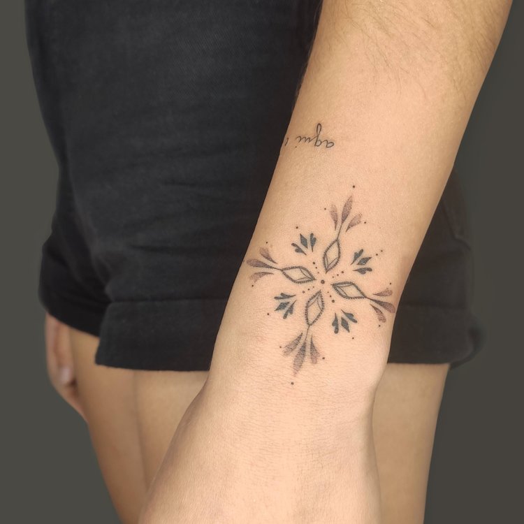 Tatuaje de Regina Tattoo