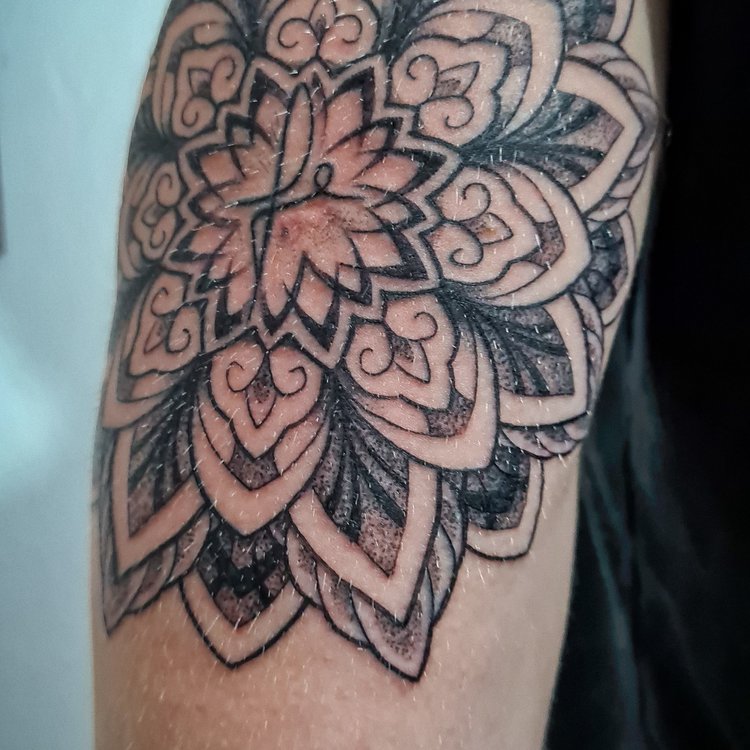 Tatuaje de Tomas Dib