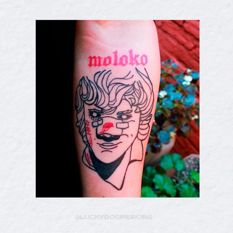 Tatuaje de Lucky Dog Tattoos