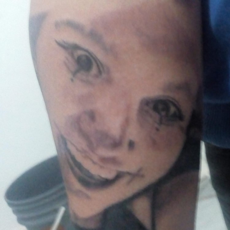 Tatuaje de Juan Gómez