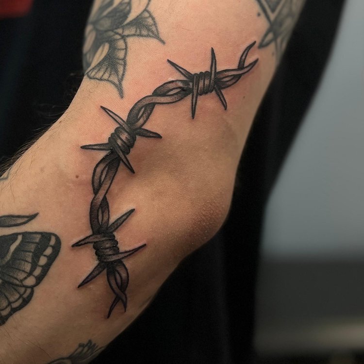 Tatuaje de Nic Tolley