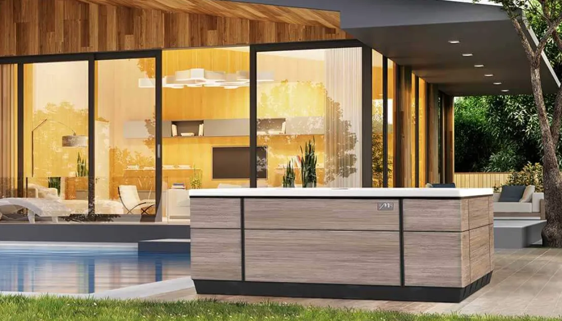 Bullfrog M-Series Spa in a luxurious backyard setting