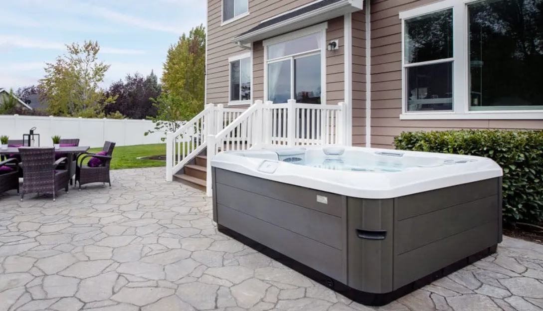 Bullfrog X-Series Spa in a backyard