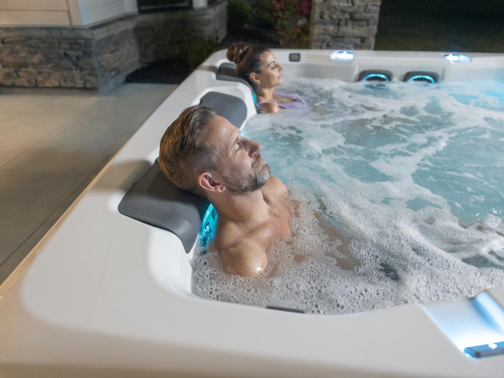 Man relaxing in a Bullfrog A-Series Spa