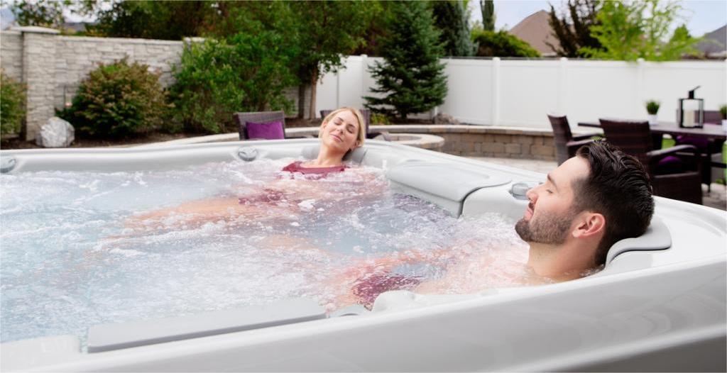 Couple relaxing in a Bullfrog X-Series Spa