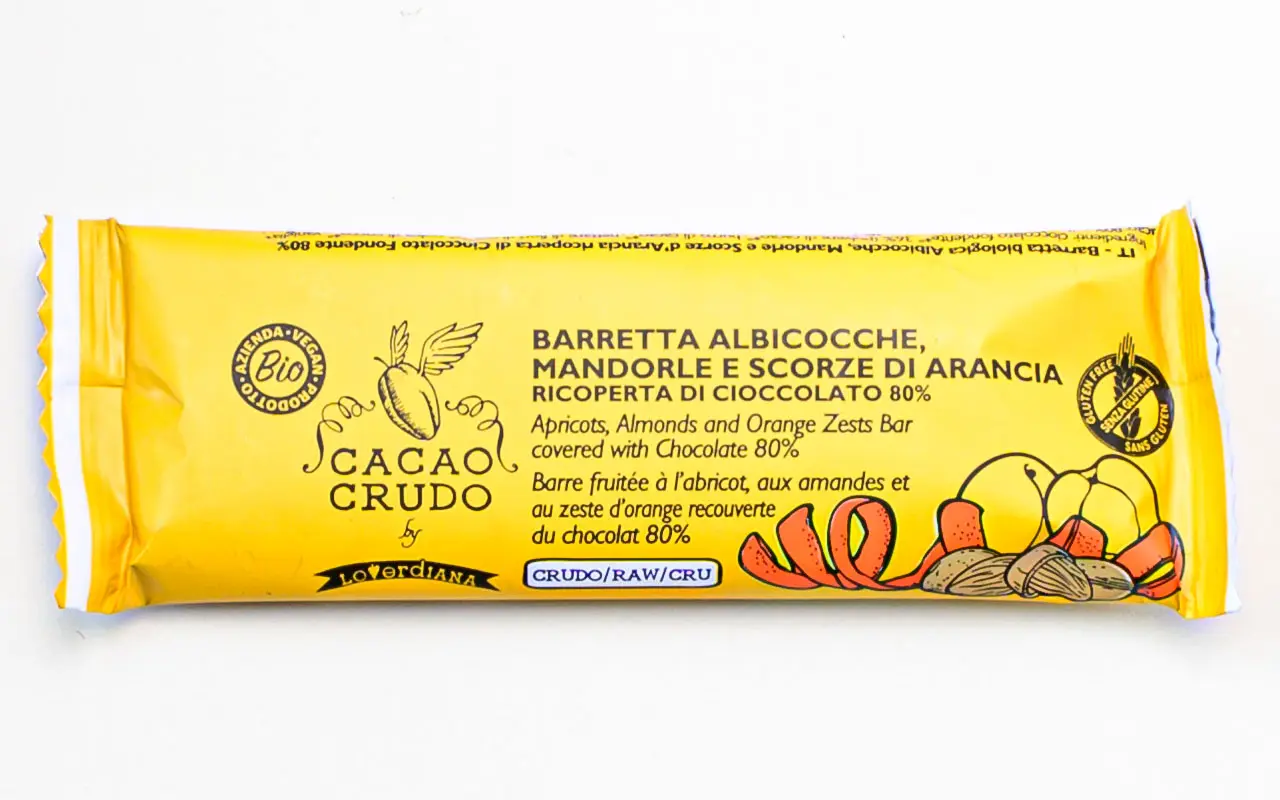 Snack santé, barre bio aux amandes abricots et écorces d'orange enrobées de chocolat noir - Cacao cru, paquet de 28 grammes