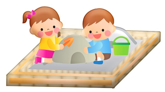 Children playing in a sandbox.