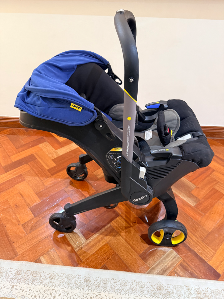 Doona Infant Car Seat, Stroller & Baby Carrier 4