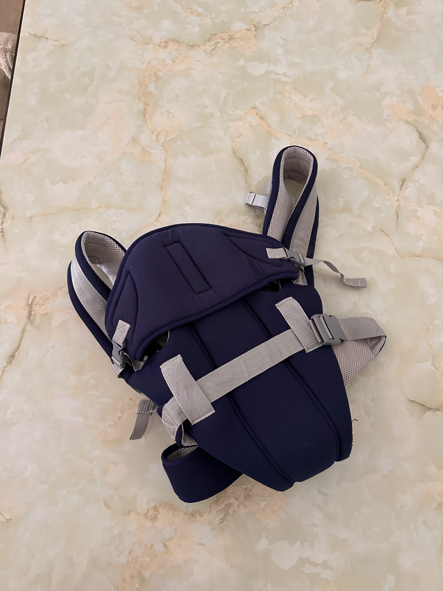 Baby Carrier with a Hood 1