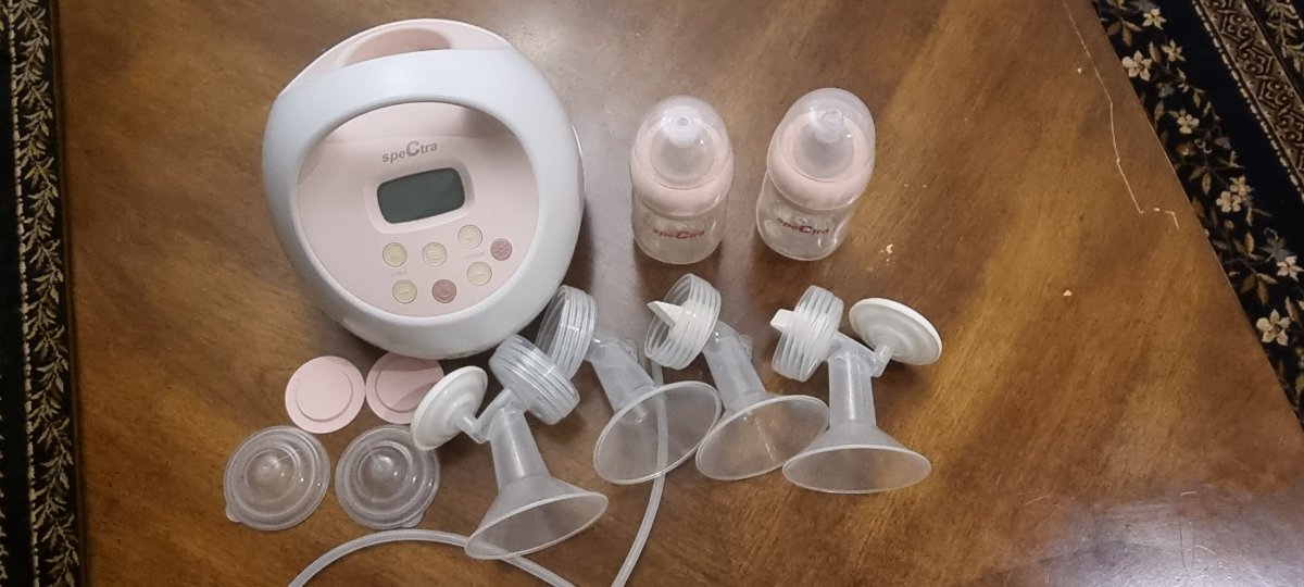 Spectra Medical Grade Breast Pump. Single or double ppl capability, vacuum suction with 2 spectra bottles.  Was never used 1