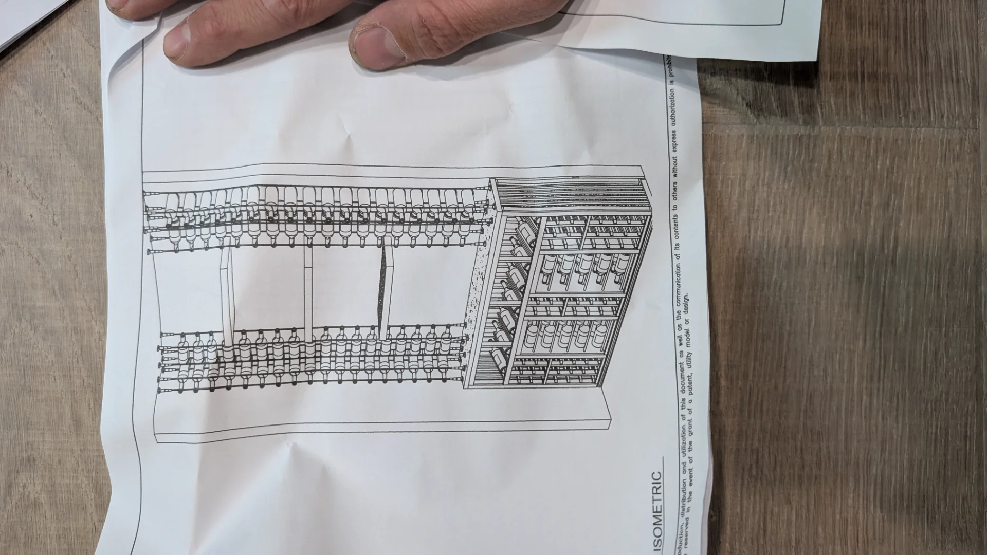 A luxury glass-enclosed wine cellar featuring custom wooden storage and cable wine racks, set against an Art Deco patterned wallpaper in a modern Austin, Texas home. - Detail 4