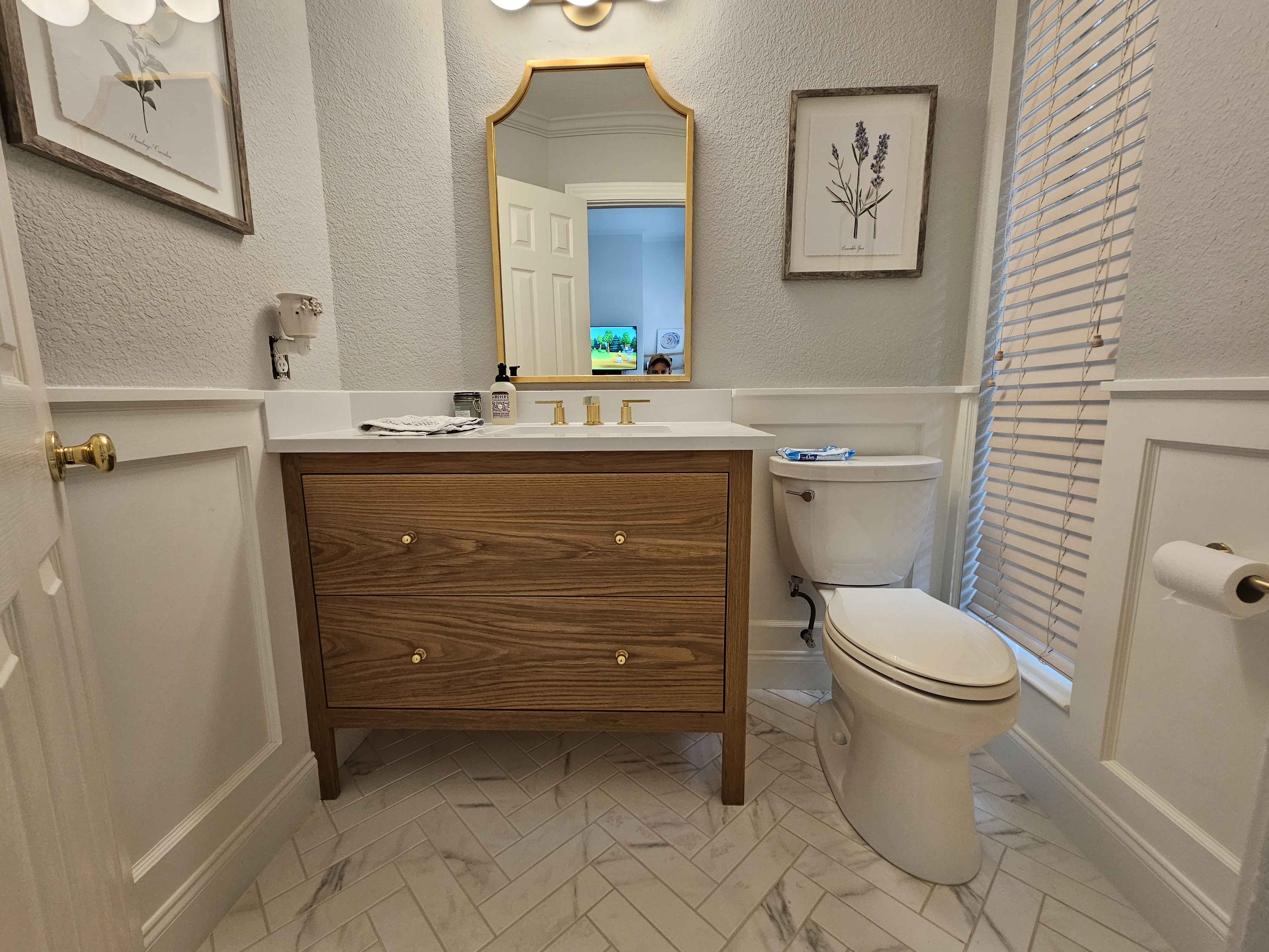 Bespoke White Oak Powder Room with Herringbone Marble