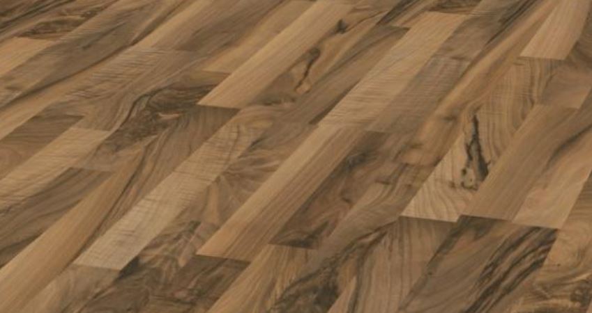0007694_jhb-promo-kronotex-laminate-flooring-standard-ticino-walnut-7-mm.jpeg