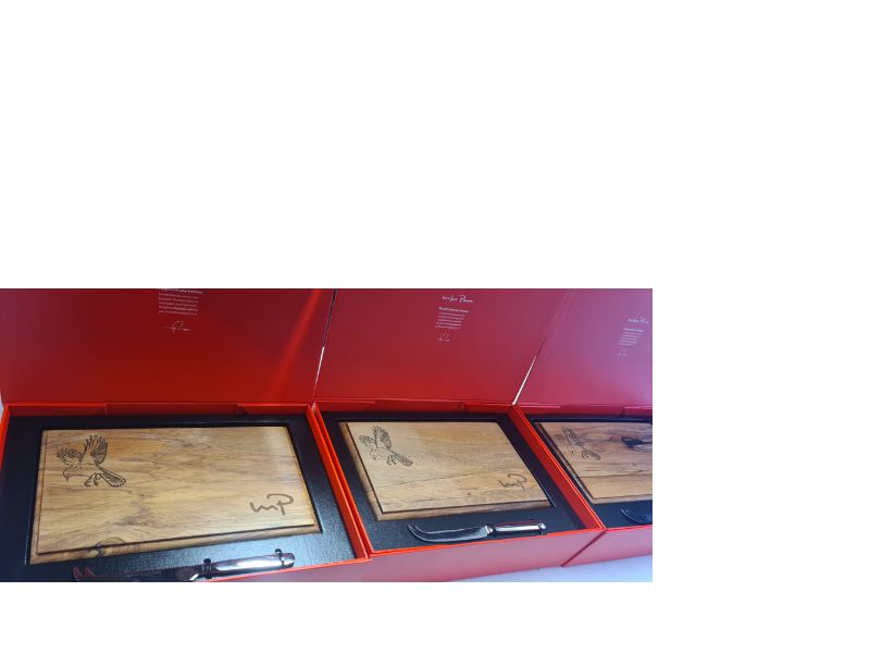 Engraved cheeseboards for local real estate agency