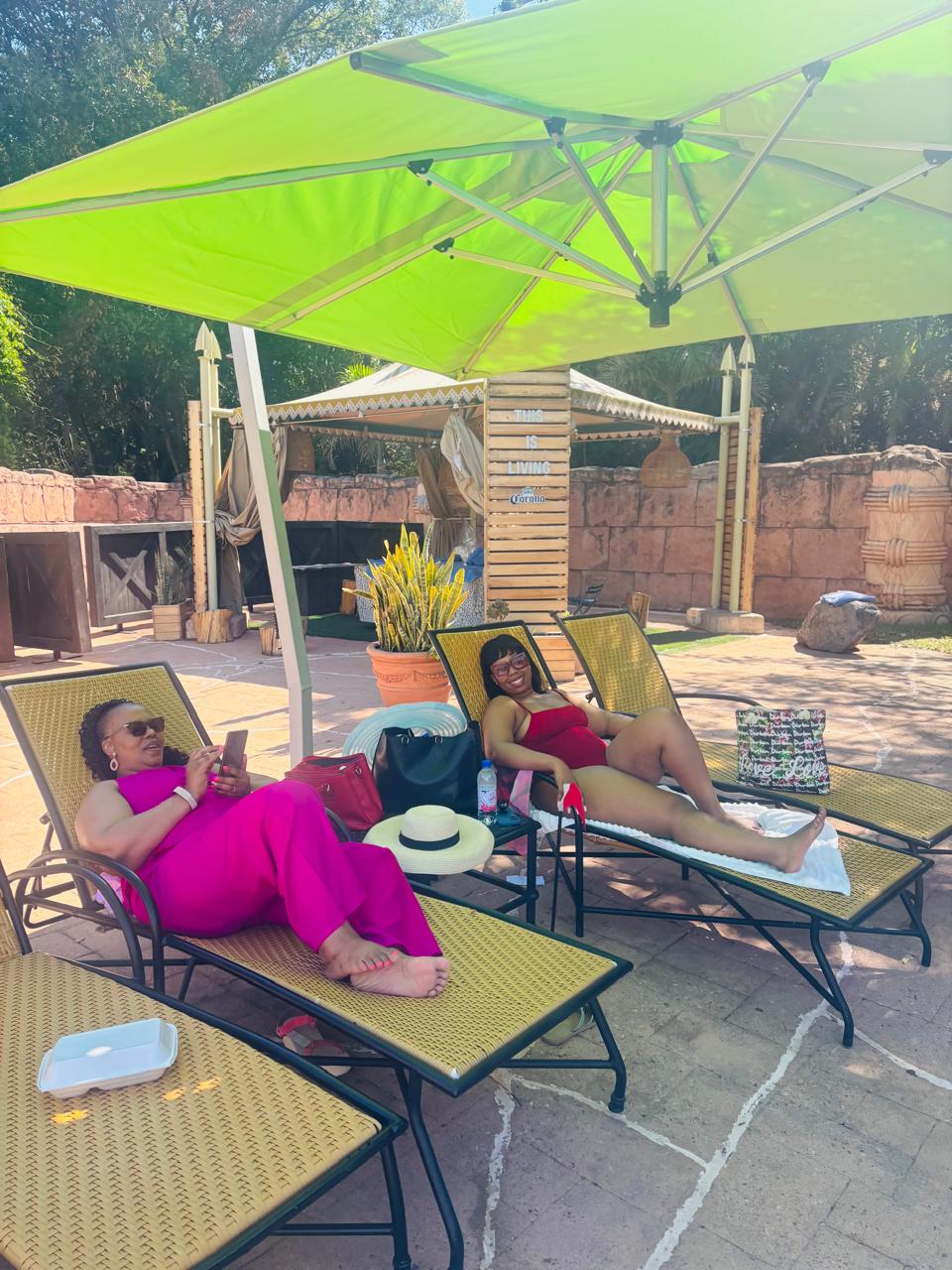 Guests relaxing poolside on a staycation