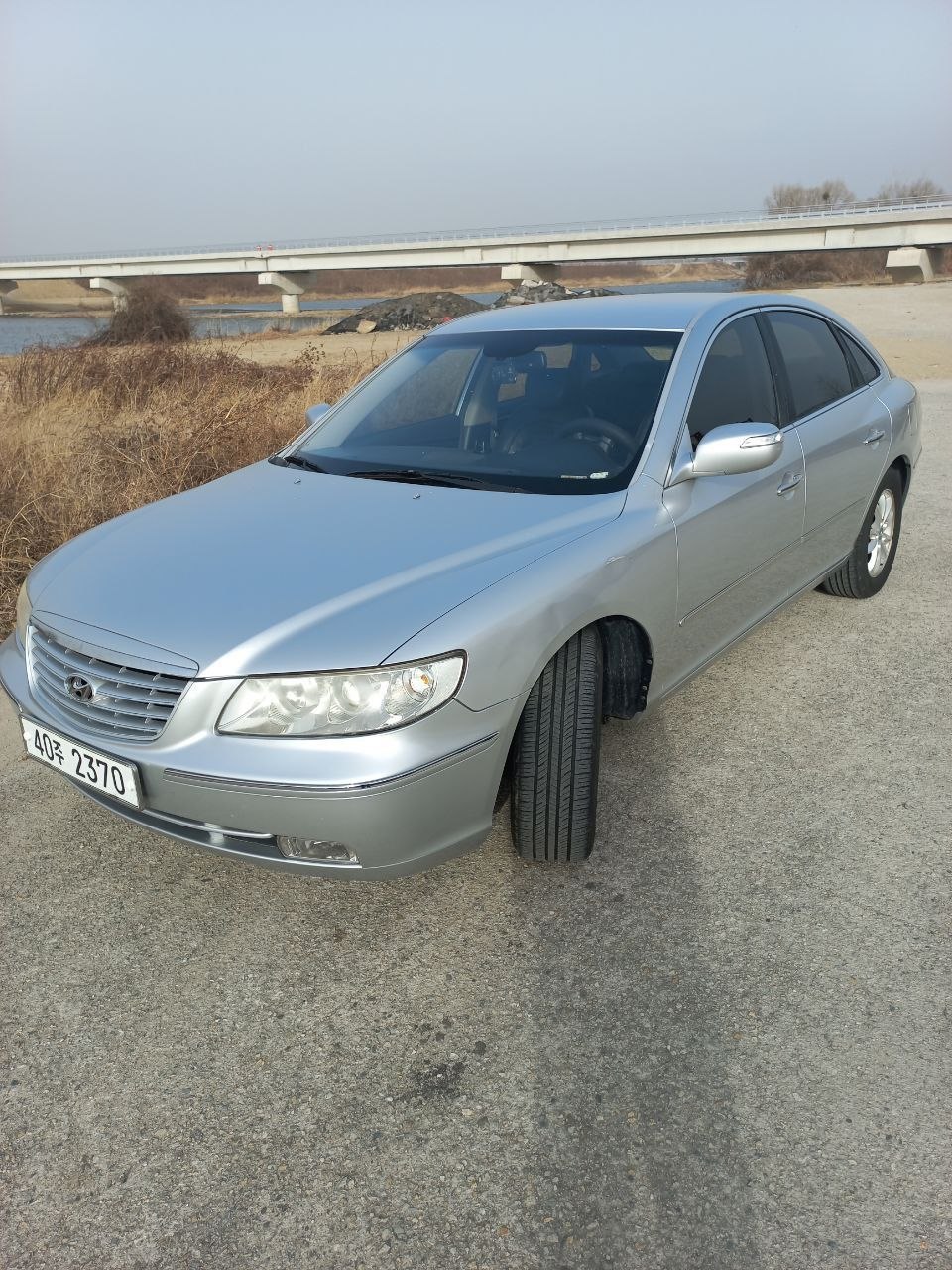 Hyundai Grandeur 2009 — ideal motor holati