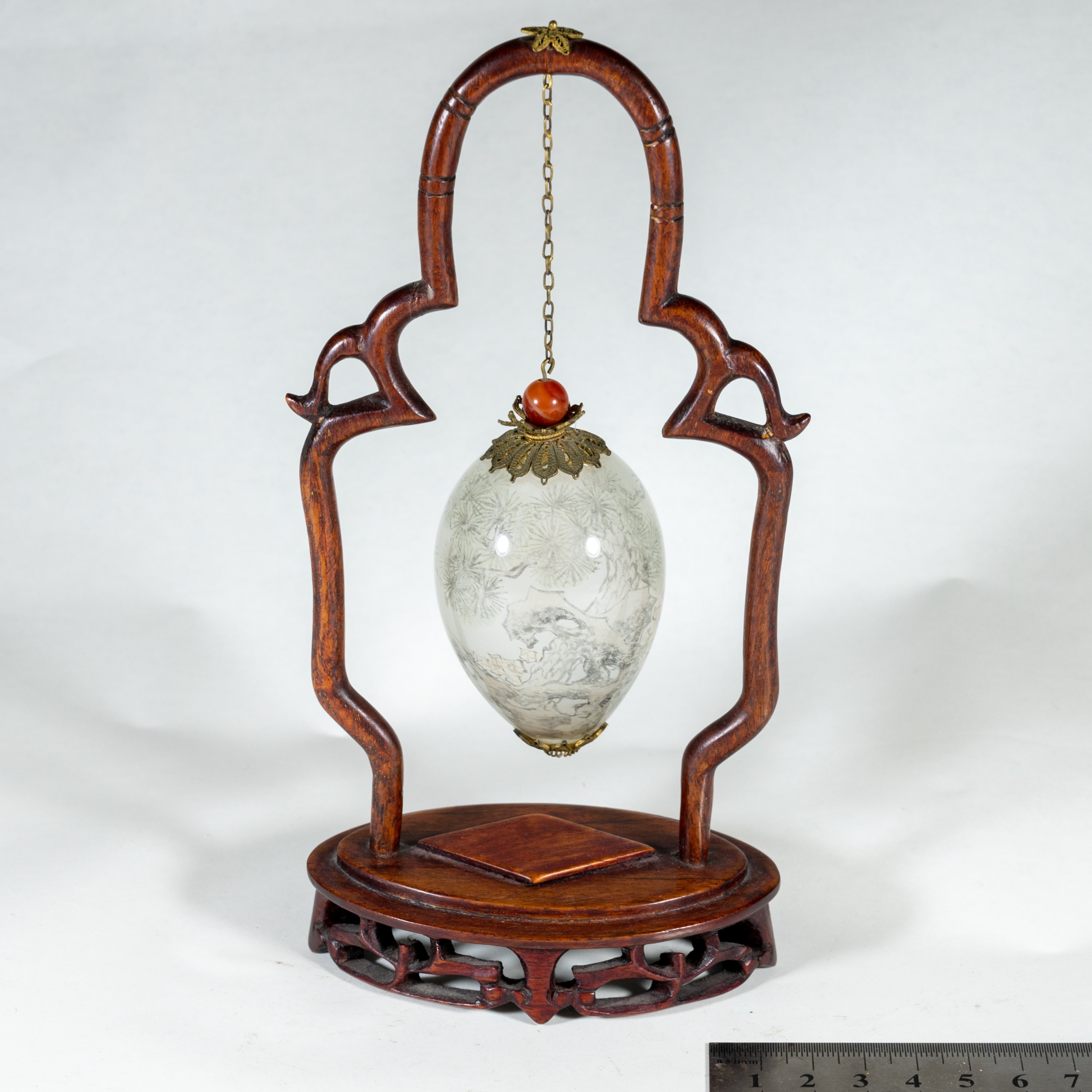Inside-painted glass egg signed Wang Xisan, 1990 — $100 – $250