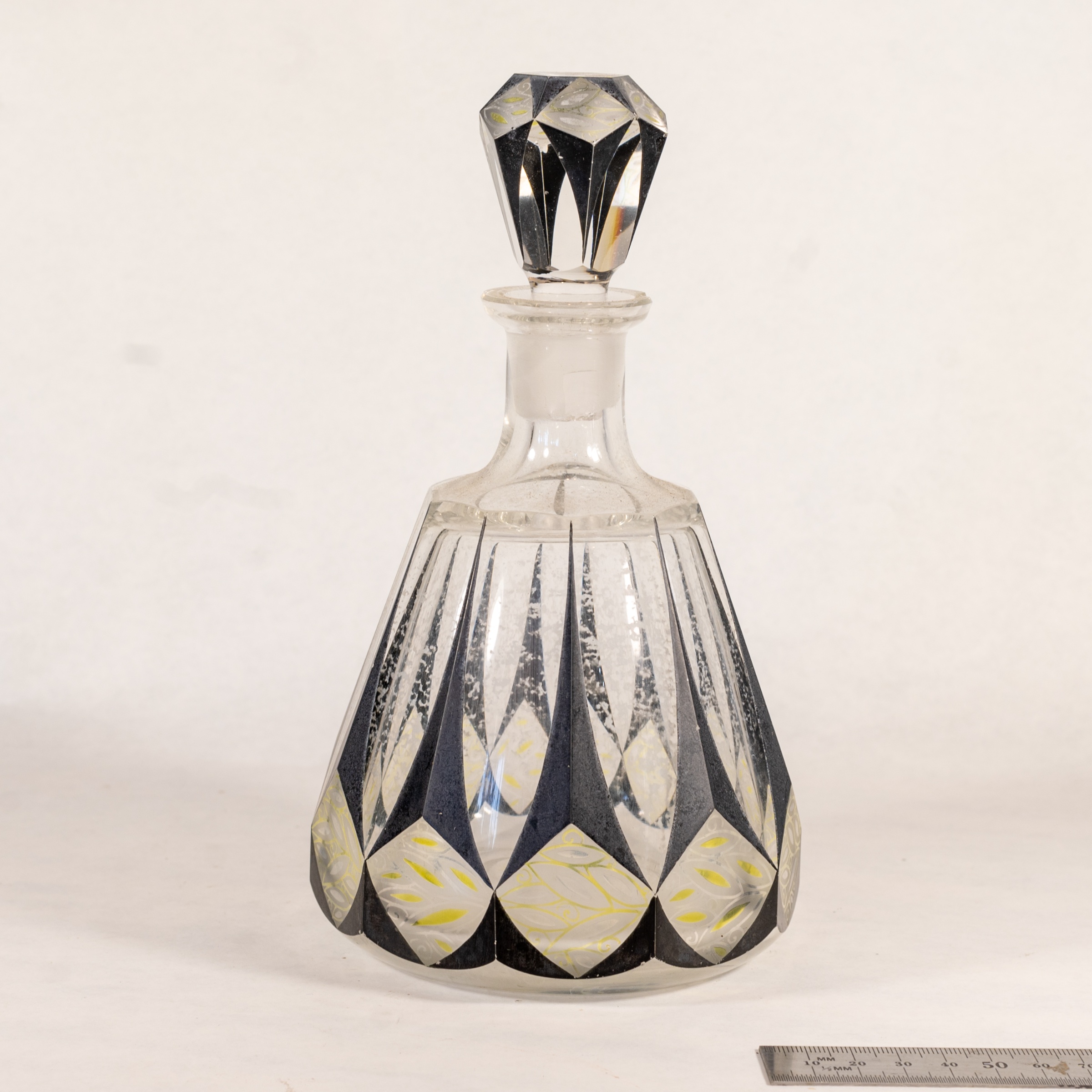 Czech Art Deco cut and enamelled decanter, attributed to Karl Palda, circa 1930, enamel flaking — estimate: £150 – £250