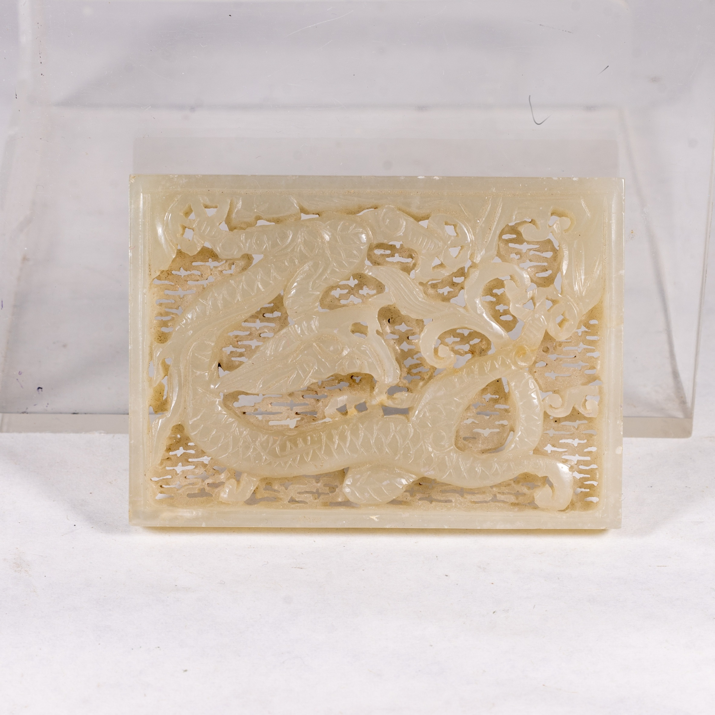 Yuan to early Ming celadon-white plaque — £4,000 – £6,000