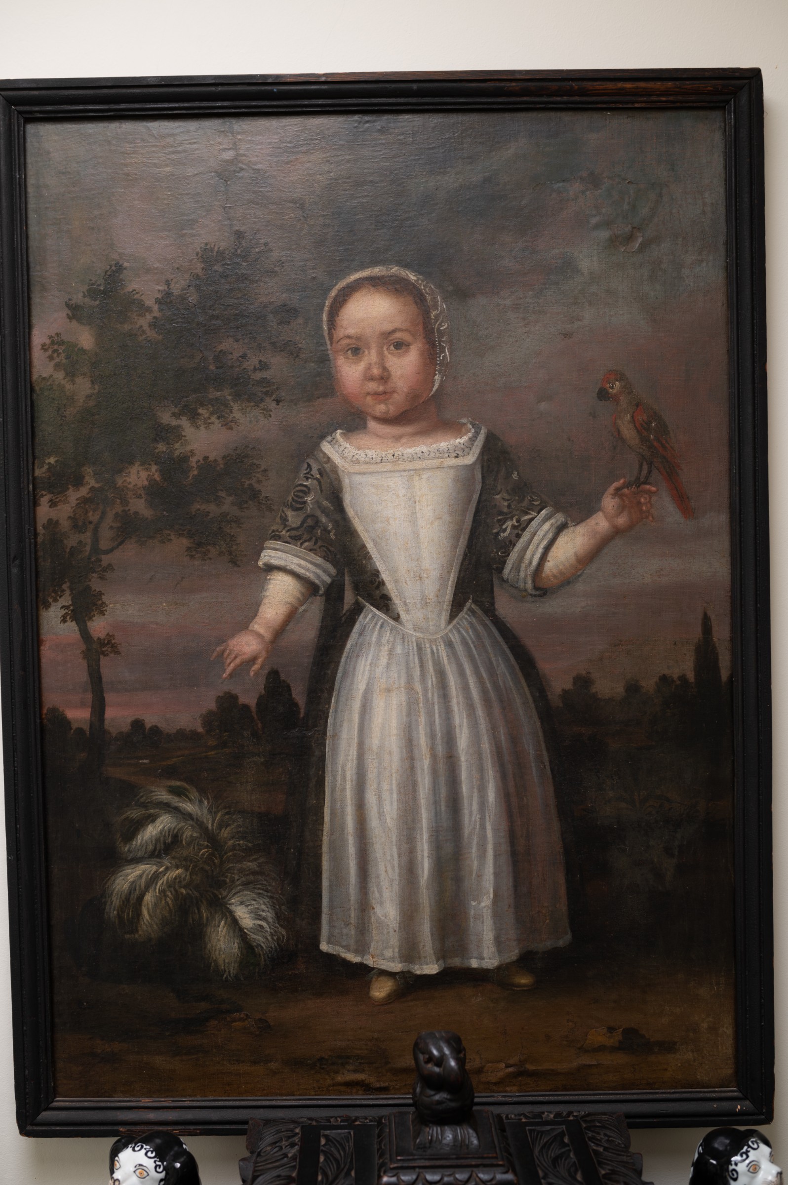Dutch School, 18th century, girl with a parrot — estimate: A$2,000 – A$3,000